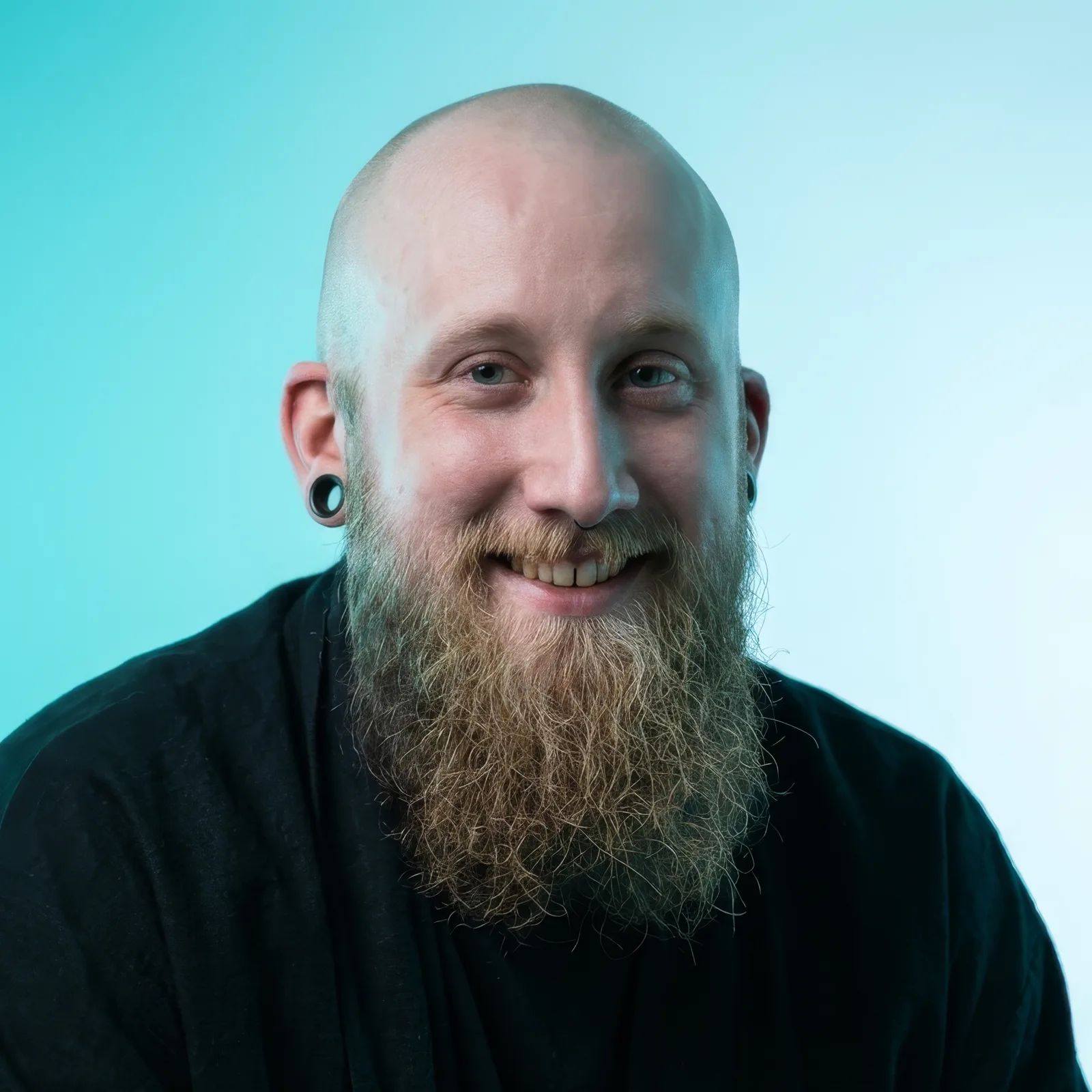 Gera, founder of Bearded Branding, smiling